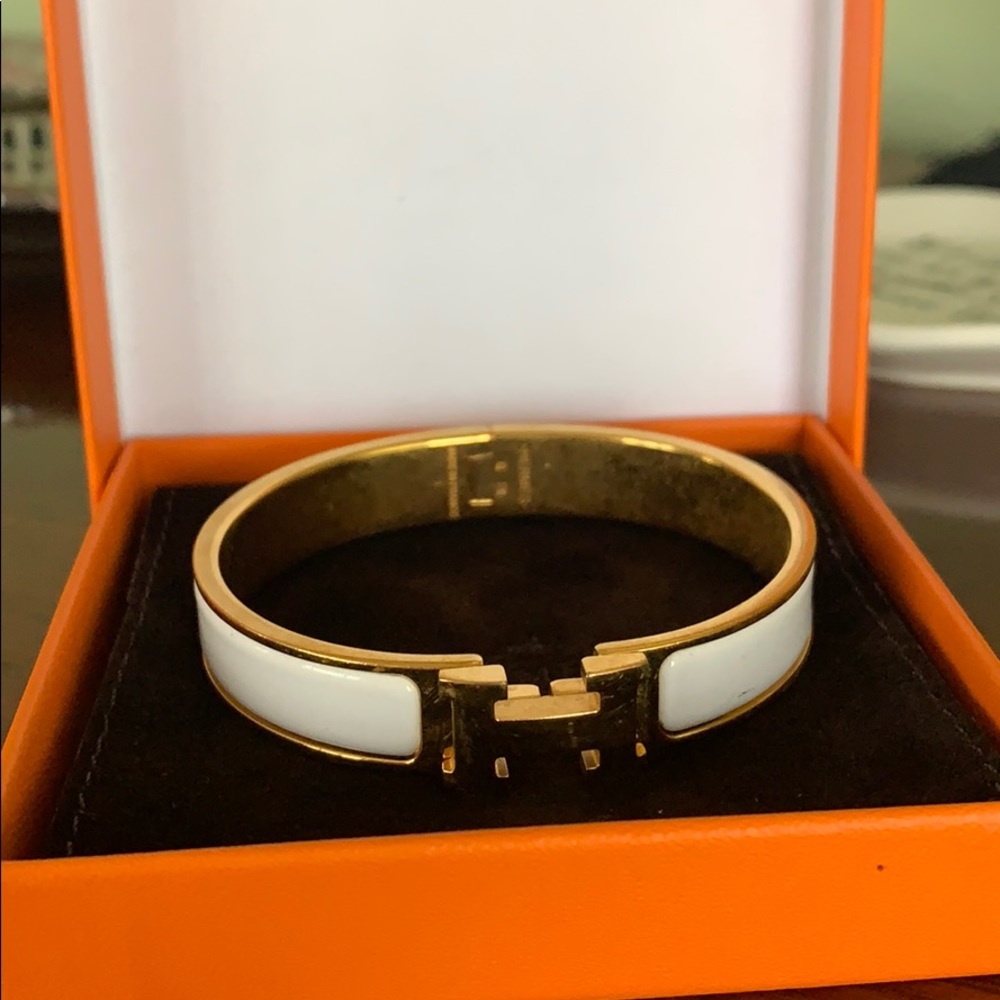 White and gold Hermès bracelet with pouch and box